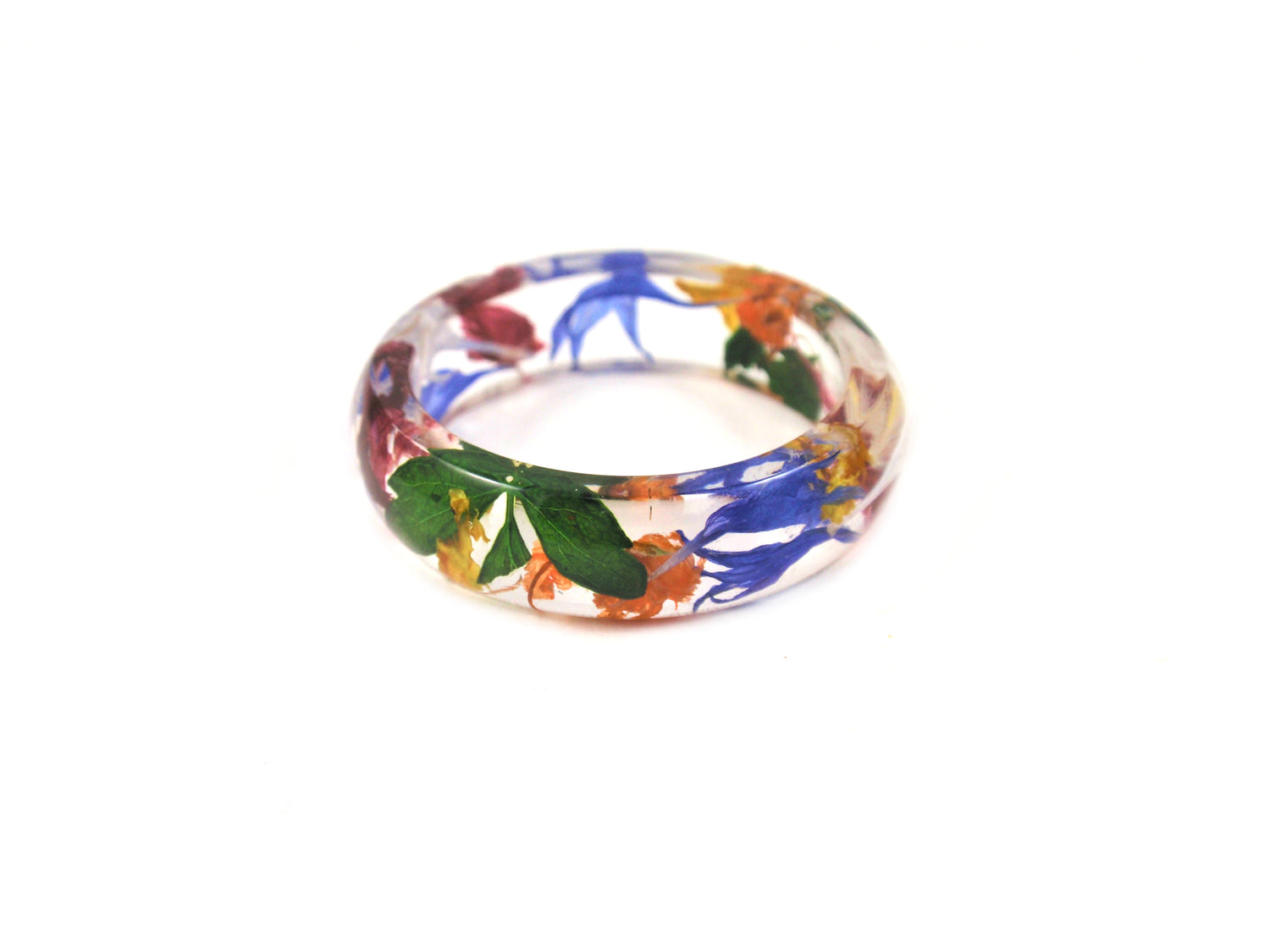 Botanical rings by Smile With Flower. Real pressed flowers and greens encased in leweler's resin. 