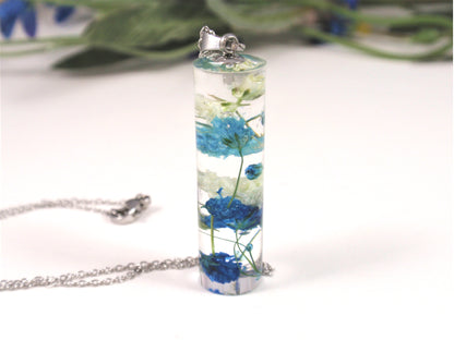 handmade crystal clear cylinder resin necklace contains real dried flowers