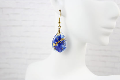 Teardrop earrings with blue Cornflower on gold plated hooks