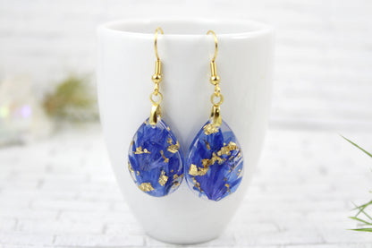 Teardrop earrings with blue Cornflower on gold plated hooks