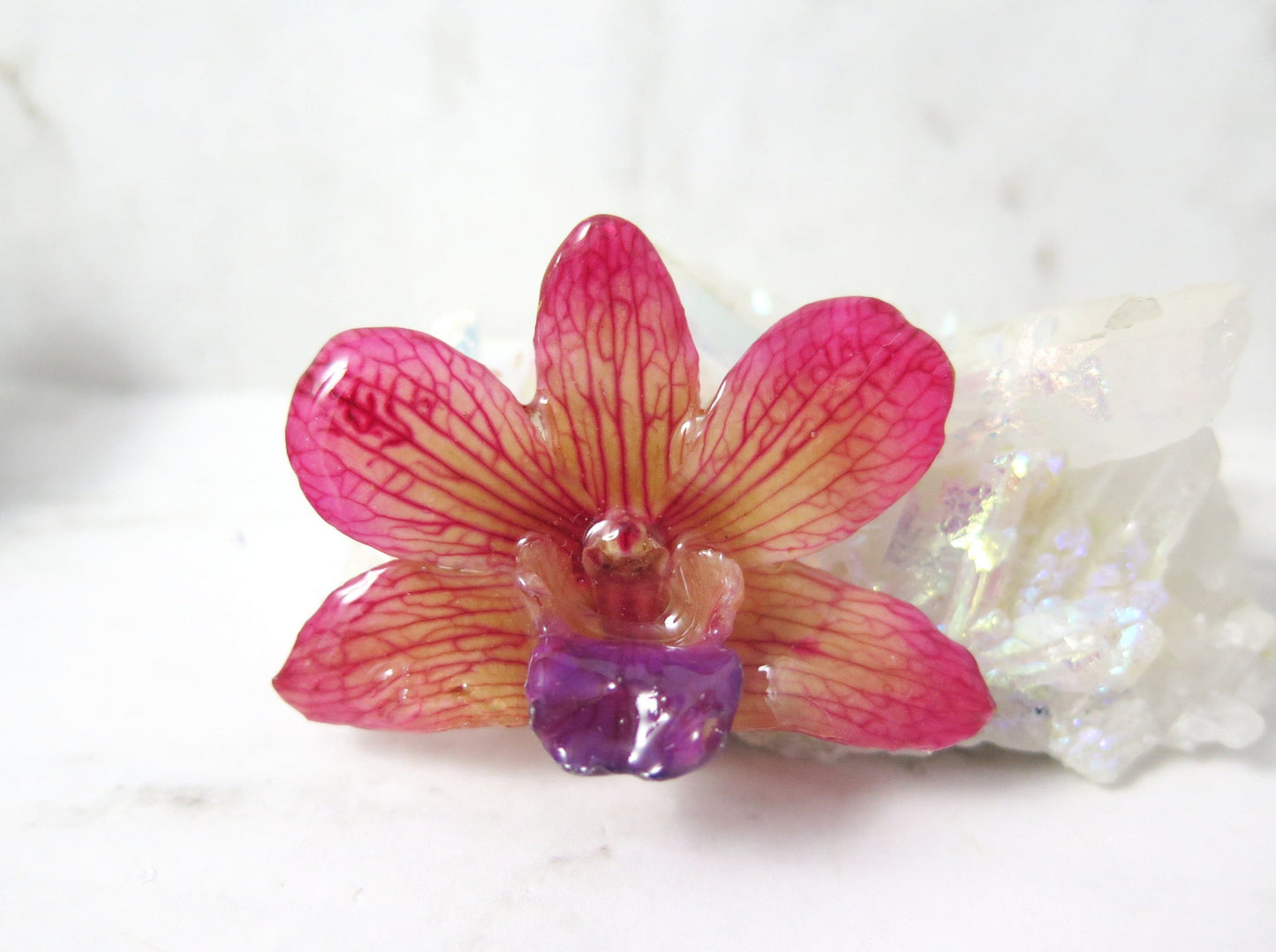 Nobile Dendrobium Orchid preserved in hand-layered resin. Real Orchid flower coated with few layers of transparent resin.  Hot oink and purple color orchid