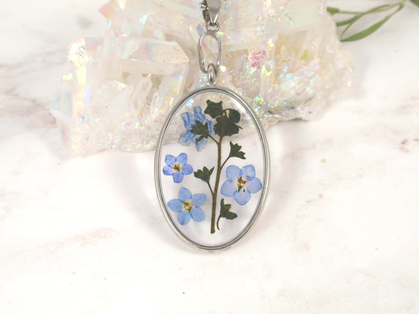 Forget Me Not flower oval necklace